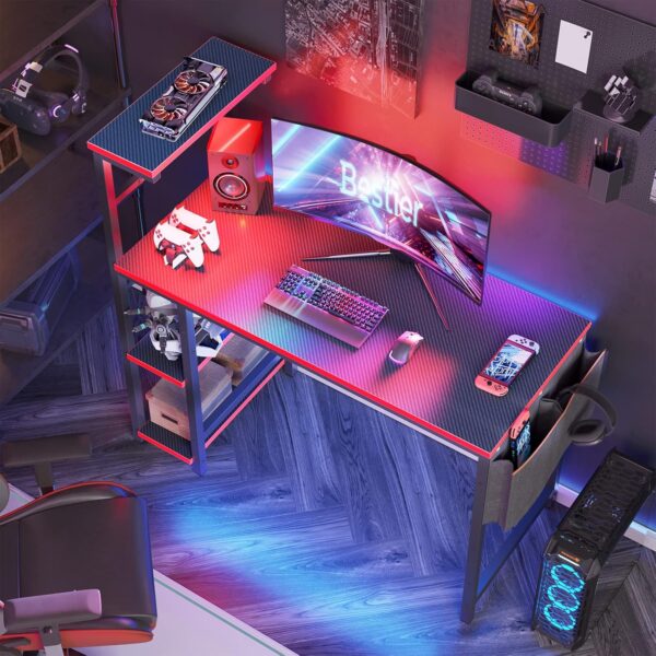 bestier gaming desk with led lights, 44 inch pc gamer desk for small spaces, computer desk with reversible storage shelves & side storage bag (black 3d carbon fiber)
