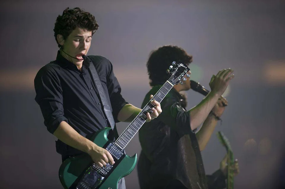 Nick Jonas and his brothers perform to the delight of thousands of young fans on Aug. 4, 2009, during the Sacramento stop of the Jonas Brothers' 2009 World Tour at Arco Arena.