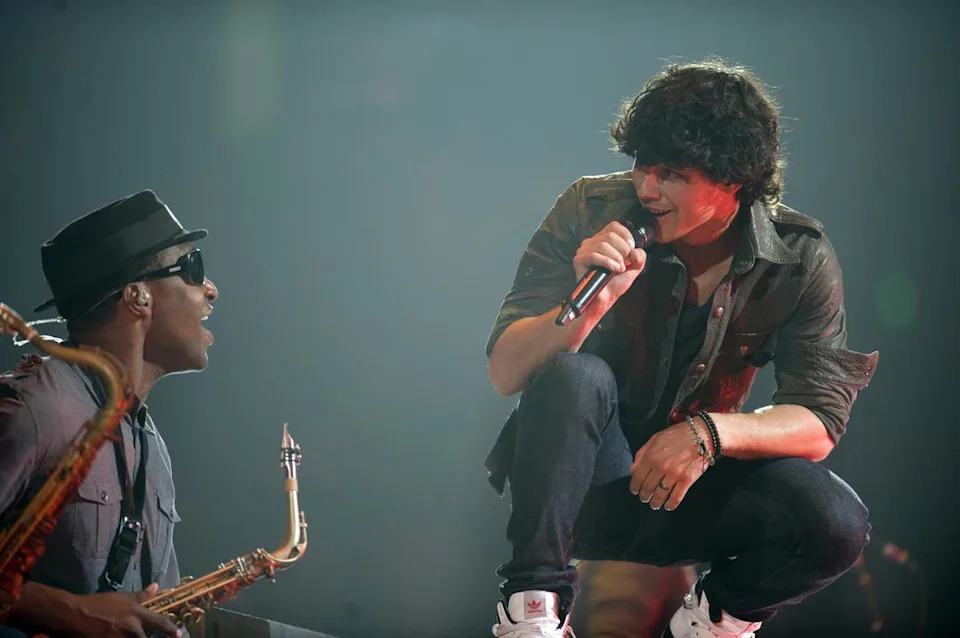 Joe Jonas and his brothers perform to the delight of thousands of young fans Aug. 4, 2009, during the Sacramento stop of the Jonas Brothers' 2009 World Tour at Arco Arena.