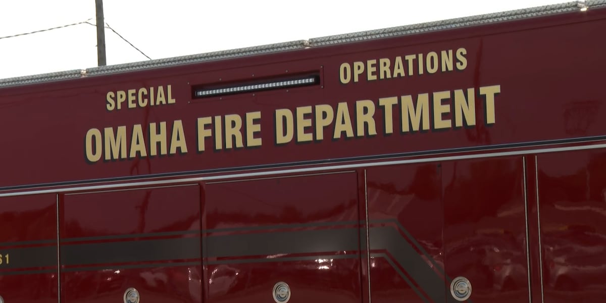 Crews fight fire in car lot in south-central Omaha