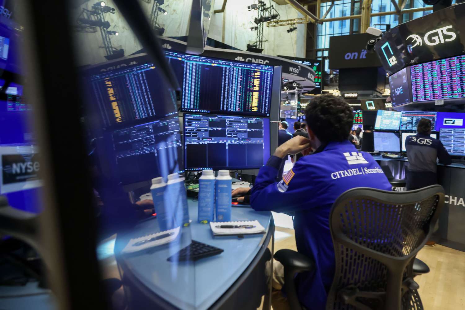 Stock Indexes Little Changed After Revised Jobs Data; Apple Expected to Unveil Latest iPhones