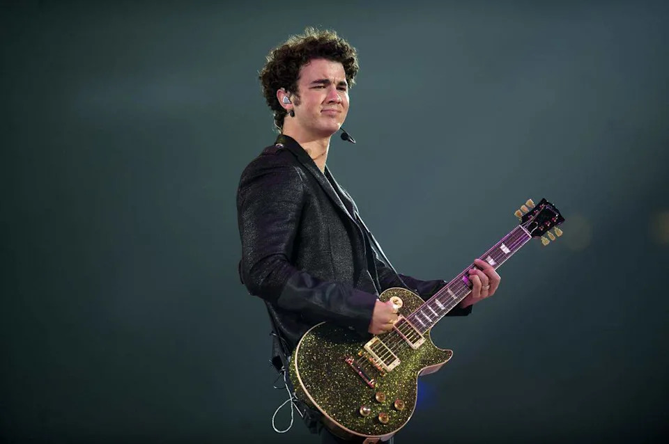 Kevin Jonas and his brothers perform to the delight of thousands of young fans on Aug. 4, 2009, during the Sacramento stop of the Jonas Brothers’ 2009 World Tour at Arco Arena.