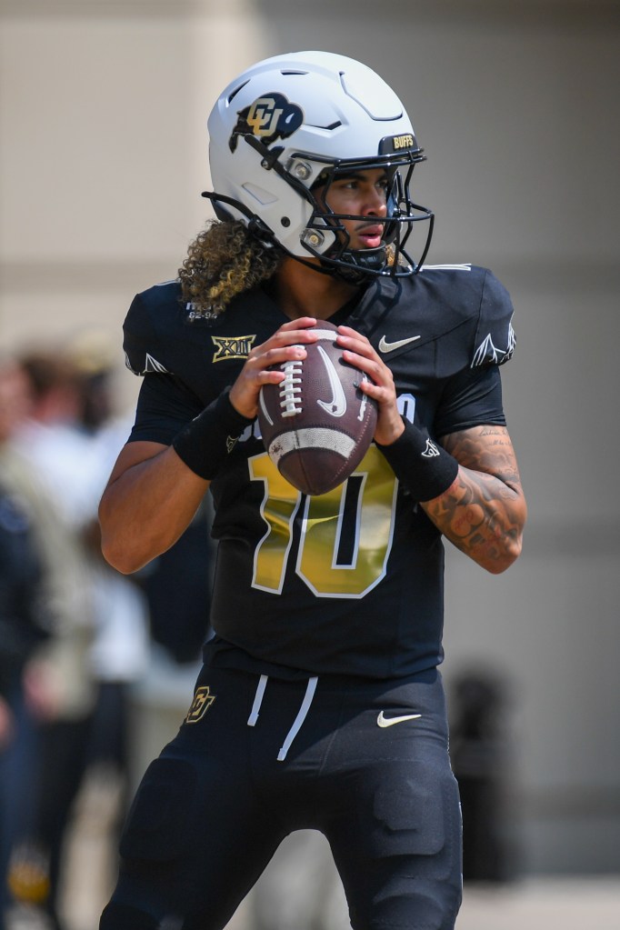 Quarterback Julian Lewis is ready to throw the ball.