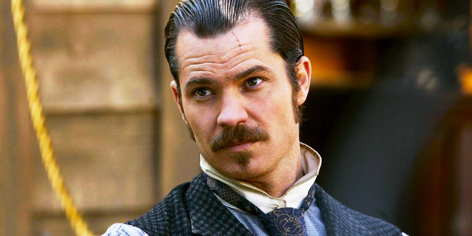 Timothy Olyphant with his hair slicked back in Deadwood
