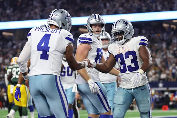 Dallas Cowboys running back Javonte Williams celebrates with quarterback Dak Prescott. Dallas Cowboys running back Javonte Williams celebrates with quarterback Dak Prescott.