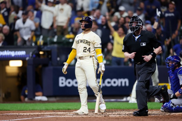 Brewers catcher William Contreras watches his solo homer during the third inning against the Cubs in Game 2 of the NL Division Series on Monday, Oct. 6, 2025, in Milwaukee. (Armando L. Sanchez/Chicago Tribune)
