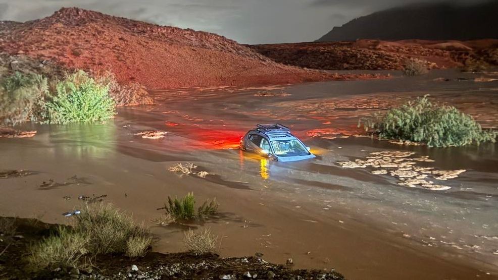 Driver rescued from partially submerged car after rains trigger flooding in Southern Utah