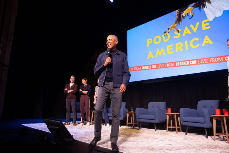 President Barack Obama in a surprise appearance at Pod Save America Live at the Warner Theater in Washington DC, on November 6, 2025.