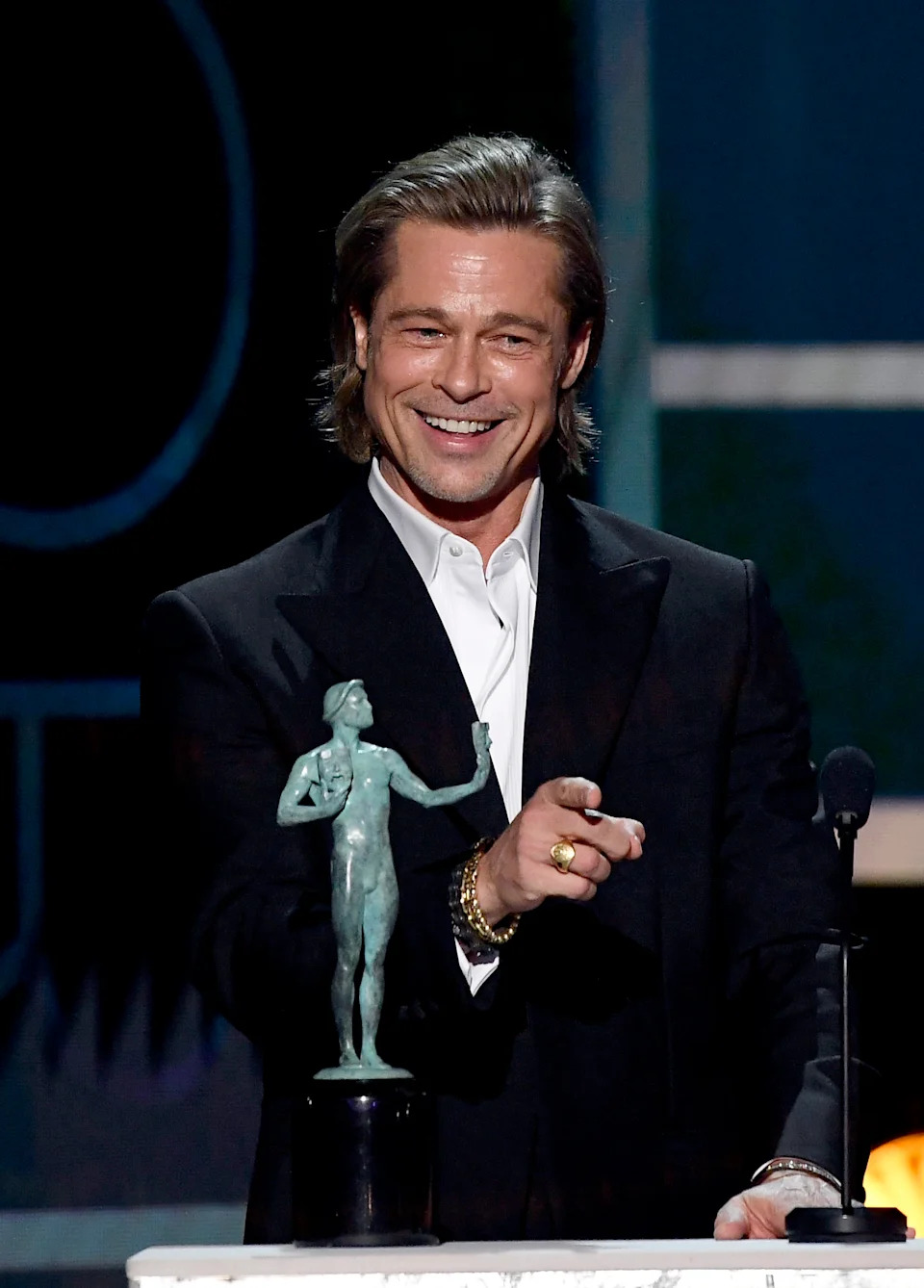 Brad Pitt on stage, smiling