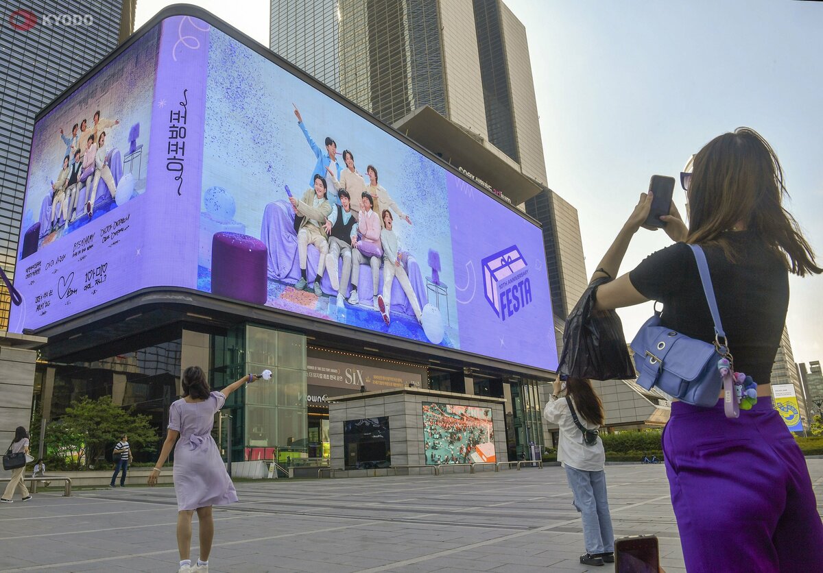 Japan woman indicted in South Korea for allegedly forcibly kissing BTS member