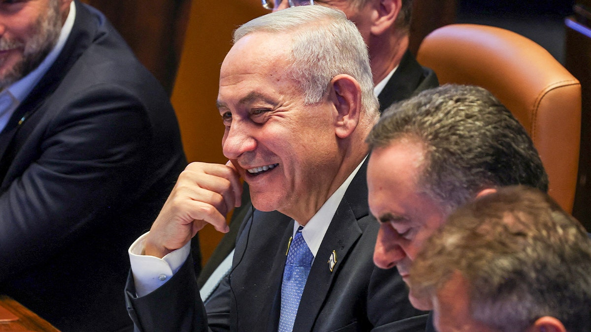 Netanyahu sits in Knesset