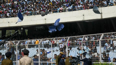 Lionel Messi’s India tour starts in Kolkata chaos as angry fans throw seats on to pitch – video
