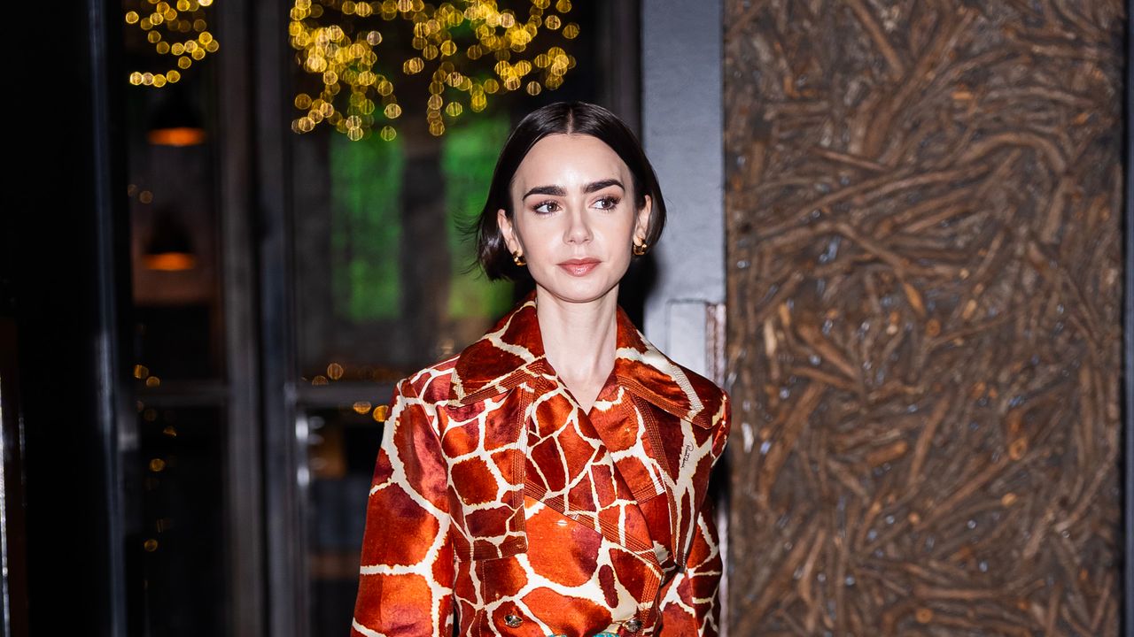 Lily Collins Channels Two Fashion Icons: Carrie Bradshaw and Fred Flintstone