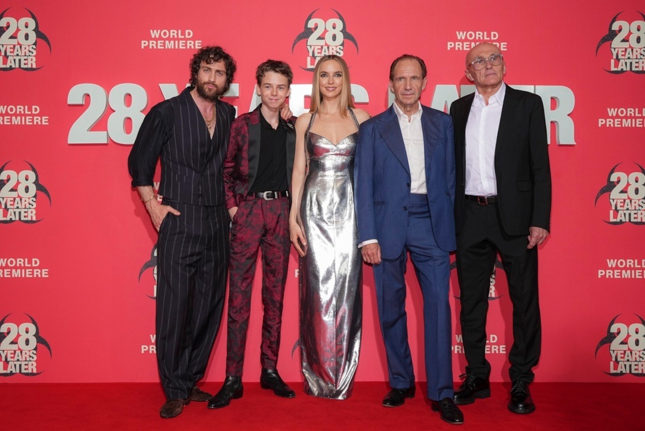 Aaron Taylor-Johnson, from left to right, Alfie Williams, Jodie Comer, Ralph Fiennes and director Danny Boyle