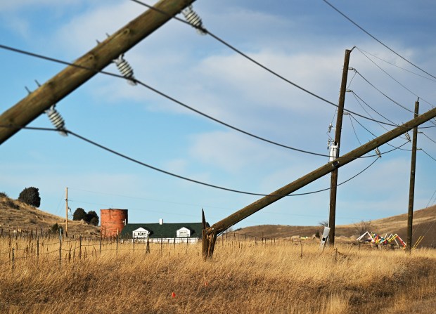 Power poles along U.S. Highway 93 near Golden snapped in half during a strong wind storm on Dec. 17, 2025. (Photo by RJ Sangosti/The Denver Post)