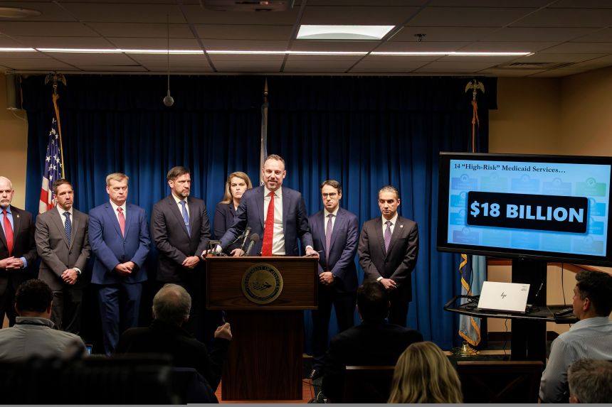 First Assistant US Attorney Joseph H. Thompson delivers a statement during a news conference at the US Attorney's Office inside the United States Courthouse on December 18 in Minneapolis.