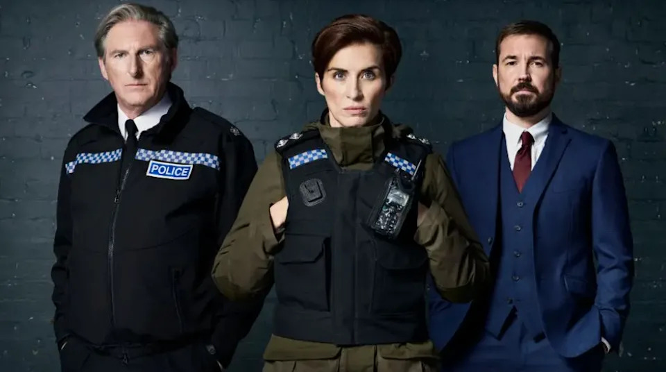 three individuals representing law enforcement and legal context