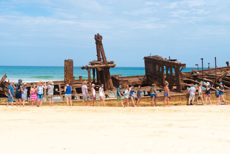 The Maheno shipwreck has drawn tourists to 75 Mile Beach for close to 100 years.