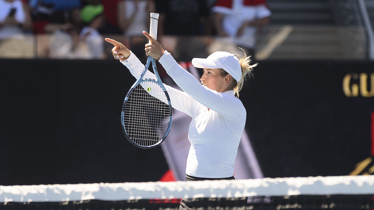 Yulia Putintseva pointing at fans