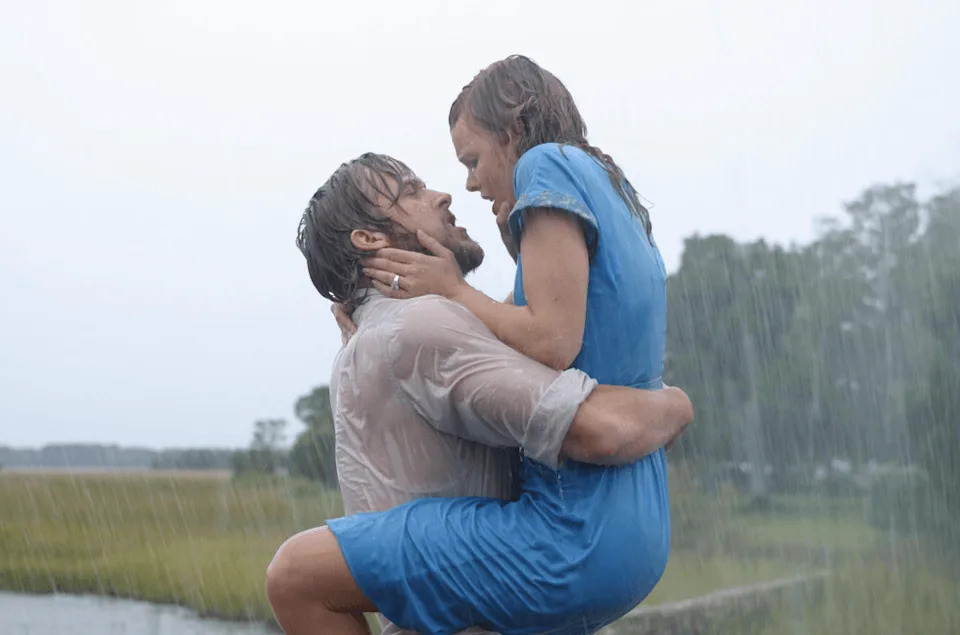 Couple embracing passionately in the rain with trees in the background. | IMDB