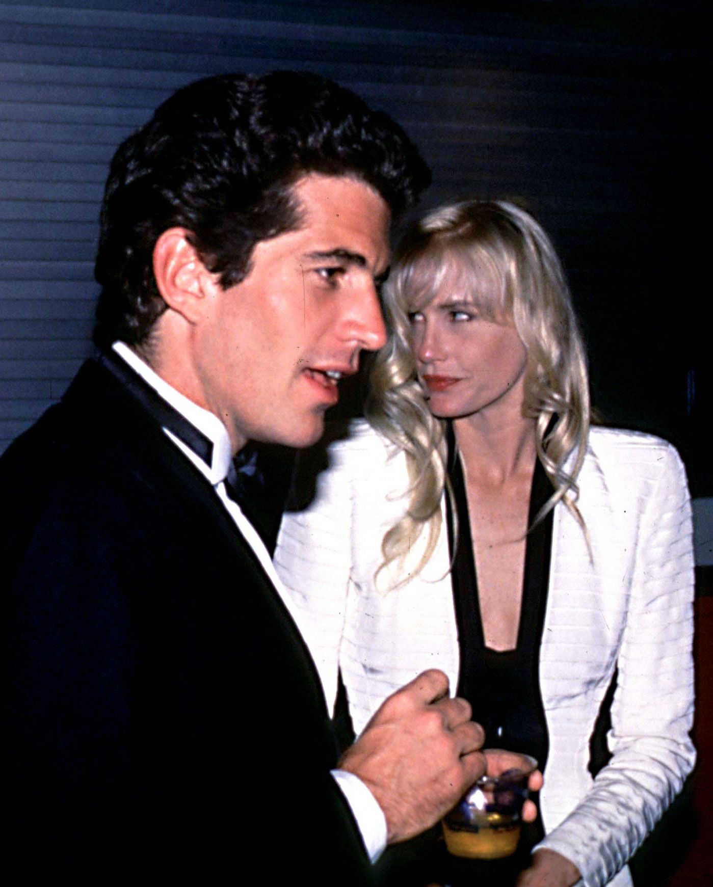 Image may contain John F. Kennedy Jr. Daryl Hannah Face Head Person Photography Portrait Clothing and Formal Wear