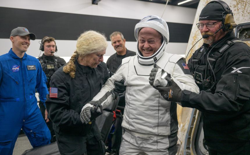 NASA astronaut Mike Fincke is helped out of the SpaceX Dragon Endeavour spacecraft aboard a SpaceX recovery ship after he and his crewmates landed in the Pacific Ocean off the coast of San Diego, California, on January 15.