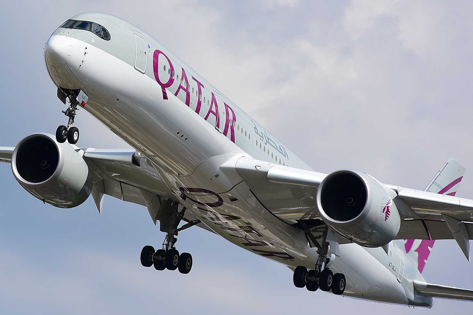 A Qatar Airways Airbus A350-900 flying 