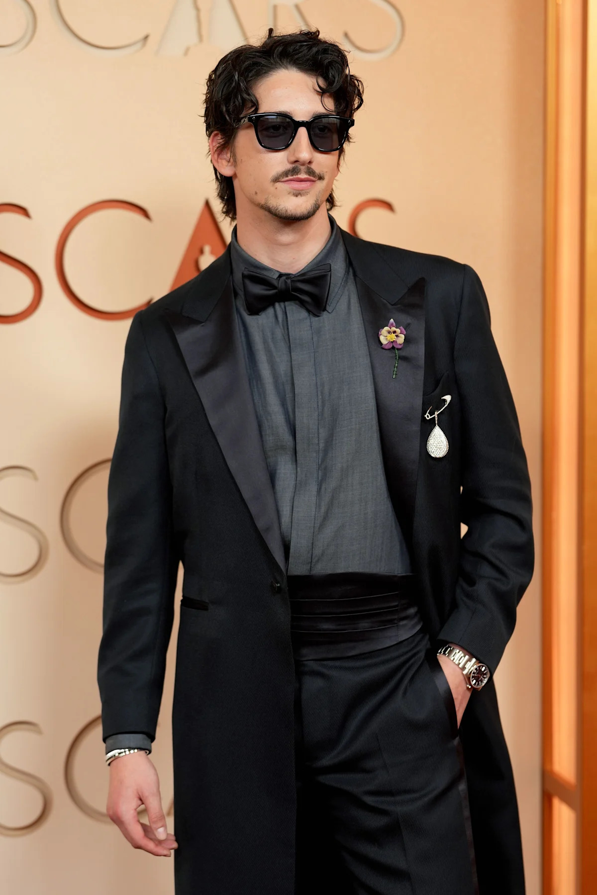 Milo Manheim Doubles Up on a Trendy Accessory at the Oscars 2026