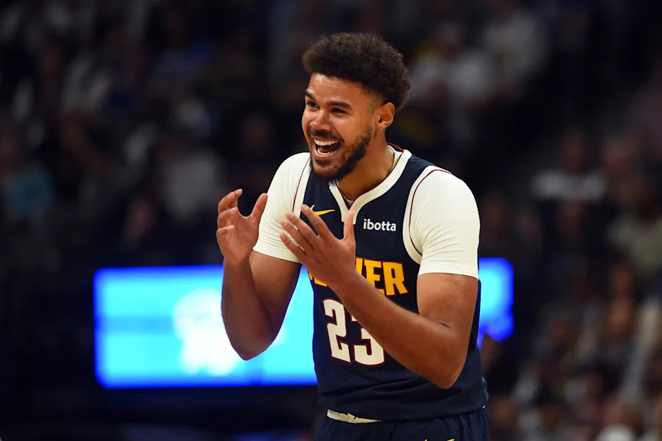 Denver Nuggets forward Cameron Johnson (23)Christopher Hanewinckel-Imagn Images