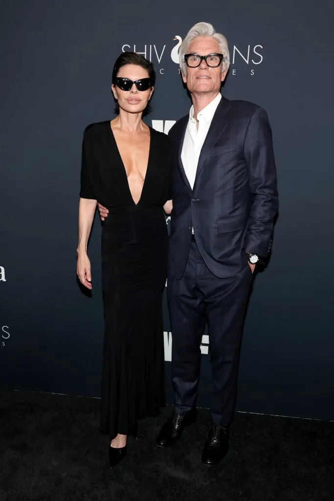 The couple have welcomed two daughters, Delilah Belle and Amelia Gray, over the years together while building their respective Hollywood careers (The pair pose together on a red carpet). Getty Images