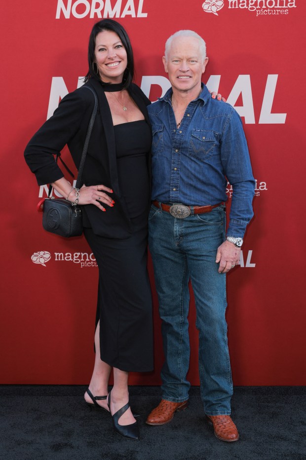 US actor Neal McDonough (R) and his wife Ruve McDonough attend the Los Angeles premiere of Magnolia Pictures' "Welcome to Normal" at the Hollywood American Legion Post 43 in Los Angeles on April 15, 2026. (Photo by Etienne Laurent / AFP via Getty Images)
