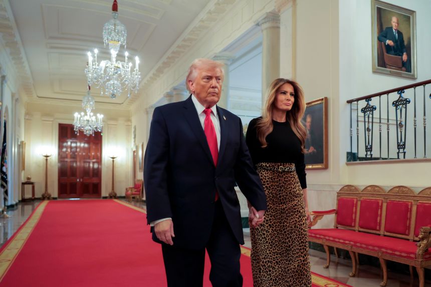 Trump and his wife, Melania, arrive for a Women's History Month event in the East Room of the White House on March 12.