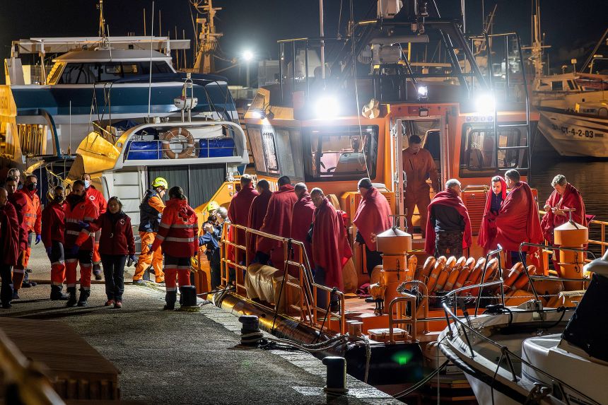 Survivors of the sinking of Russian cargo ship Ursa Major stand on the deck of a Spanish Maritime Rescue ship upon arrival at the port of Cartagena, Spain, on December 23, 2024.
