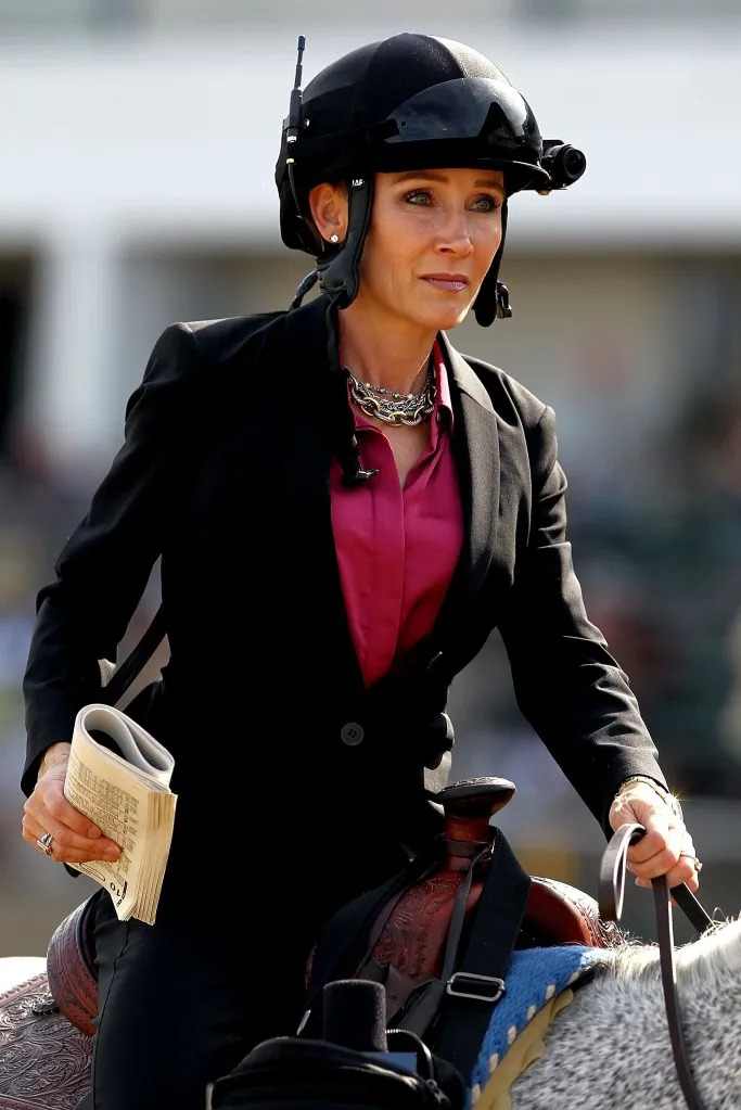 NBC commentator Donna Barton Brothers rides down the front stretch before the 88th Black-Eyed Susan Stakes at Pimlico Race Course on May 18, 2012, in Baltimore, Maryland. Getty Images